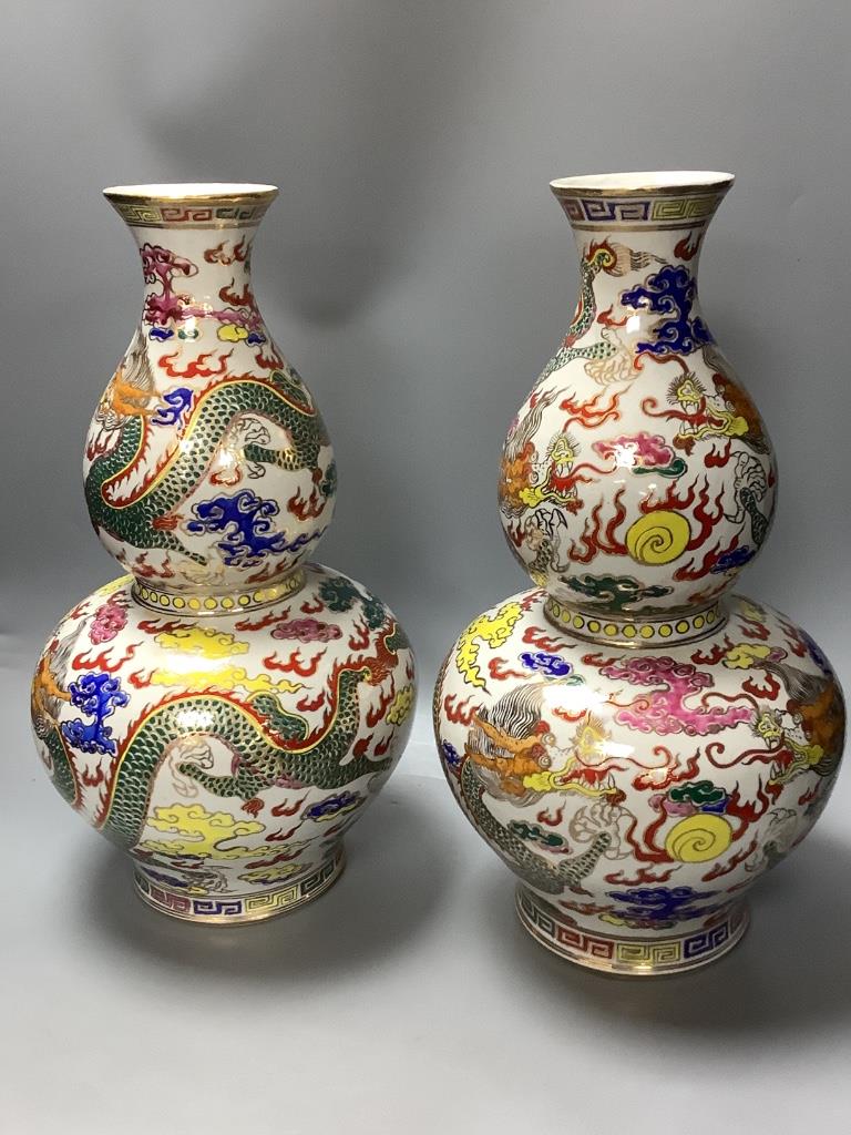 A pair of Chinese famille rose double gourd-shaped vases, height 40cm